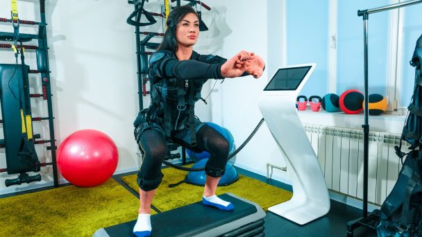 female-athlete-doing-they-exercise-ems-fitness-studio-scaled.jpg