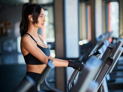 fit-woman-doing-cardio-in-gym-2021-08-28-18-35-29-utc-scaled.jpg