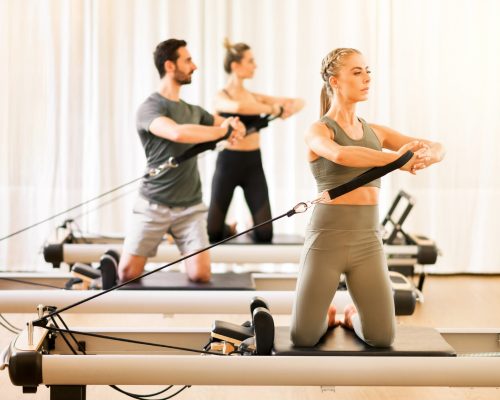 group-of-people-doing-pilates-torsion-rotation-exe-2021-08-27-23-00-17-utc-2-scaled.jpg