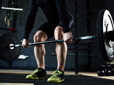 lifting-barbell-in-gym-2021-09-24-01-24-08-utc-scaled.jpg