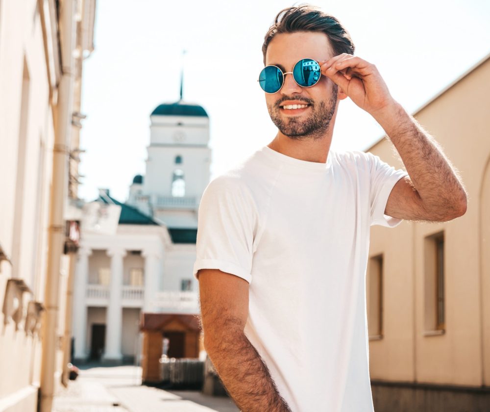 man-with-sunglasses-wearing-white-t-shirt-posing-scaled.jpg