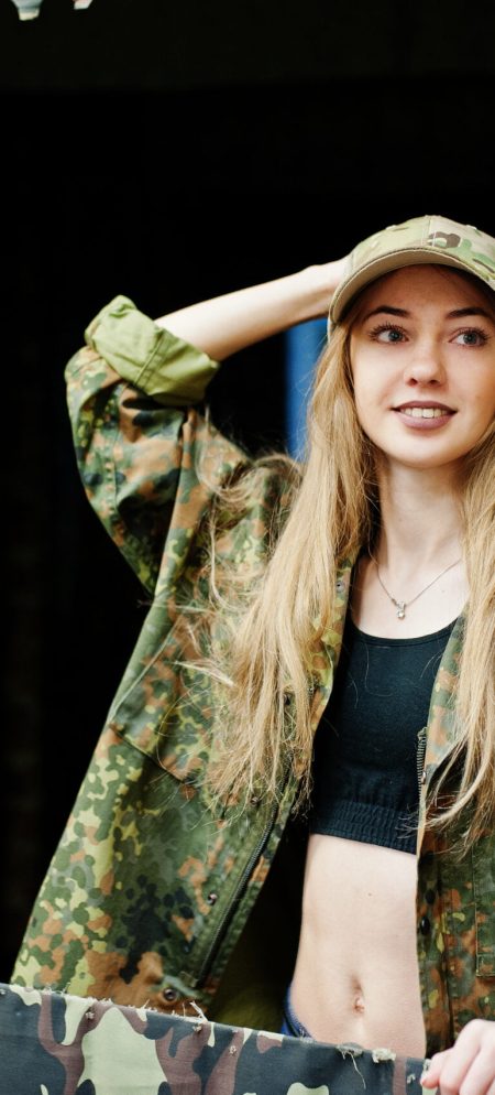 military-girl-camouflage-uniform-against-army-background-shooting-range-scaled.jpg