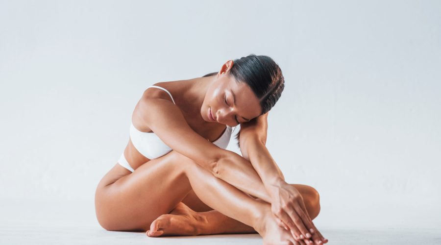 sitting-on-the-floor-beautiful-woman-with-slim-bo-2021-09-02-23-23-11-utc-scaled.jpg