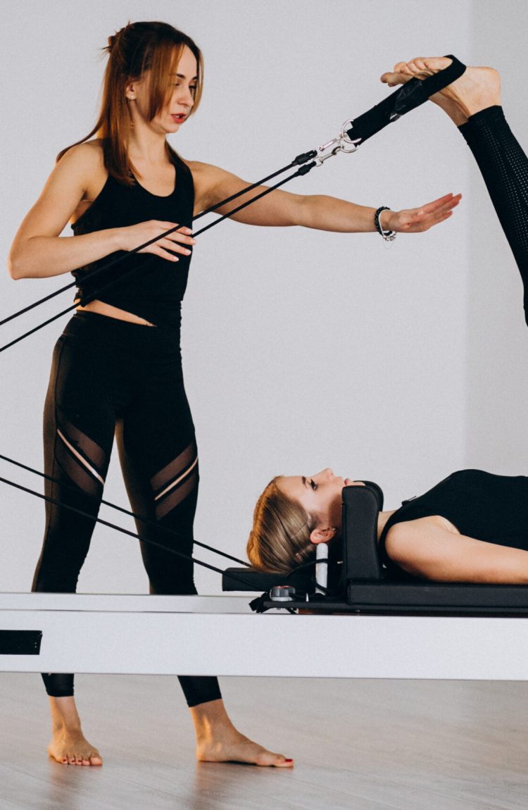 women-doing-pilates-reformer-scaled.jpg women-doing-pilates-reformer-scaled.jpg